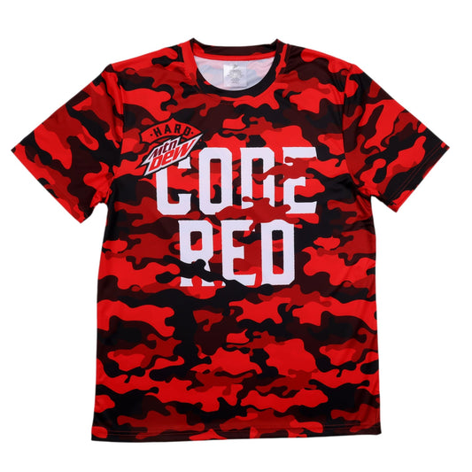 A short-sleeved athletic t-shirt featuring a red and black camouflage pattern. On the front of the shirt, the 'Hard Mtn Dew' logo is printed in the upper left chest area, followed by large, white block letters spelling 'CODE' on the first line and 'RED' directly below it, centered on the chest.