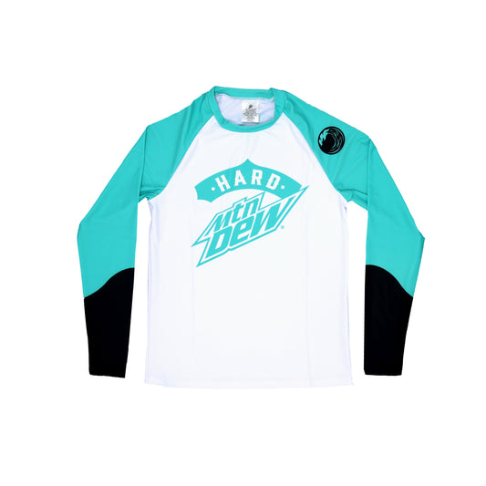 Long sleeve rash guard in Baja Blast colors. The body of the rash guard is white with a large teal Hard Dew logo on the chest. The raglan-style shoulders are teal blue with a black circular wave illustration on the right shoulder. The sleeves feature an abrupt color change from teal to black midway between the wrist and elbow.