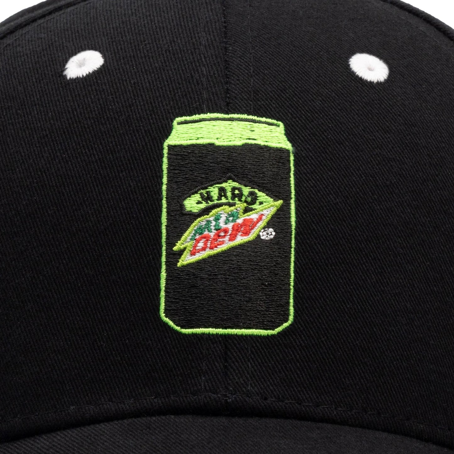 Close up of Hard Mountain Dew embroidered black and green can logo. Two contrast white eyelets on the front of the hat. 